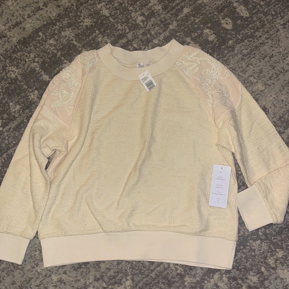 Beige sweater w beautiful embroidery. Brand new